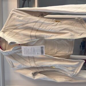 Cream Zip-Up Jacket with Gold Accents